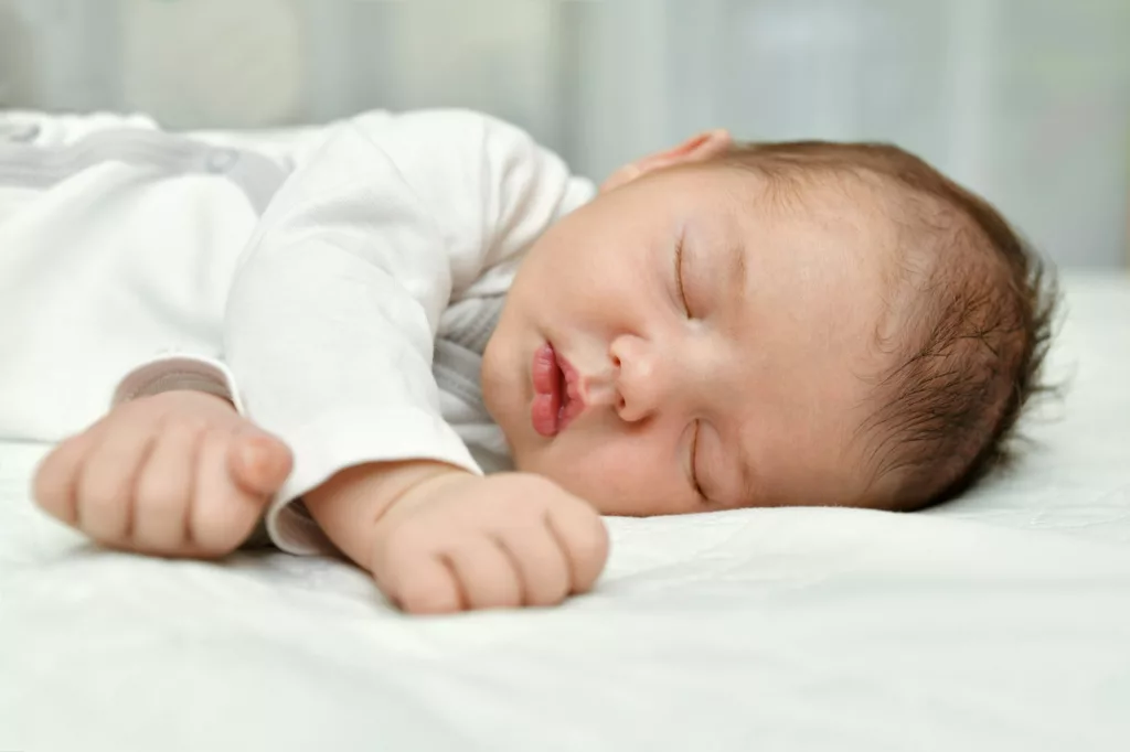 Newborn baby sleep first days in a maternity hospital